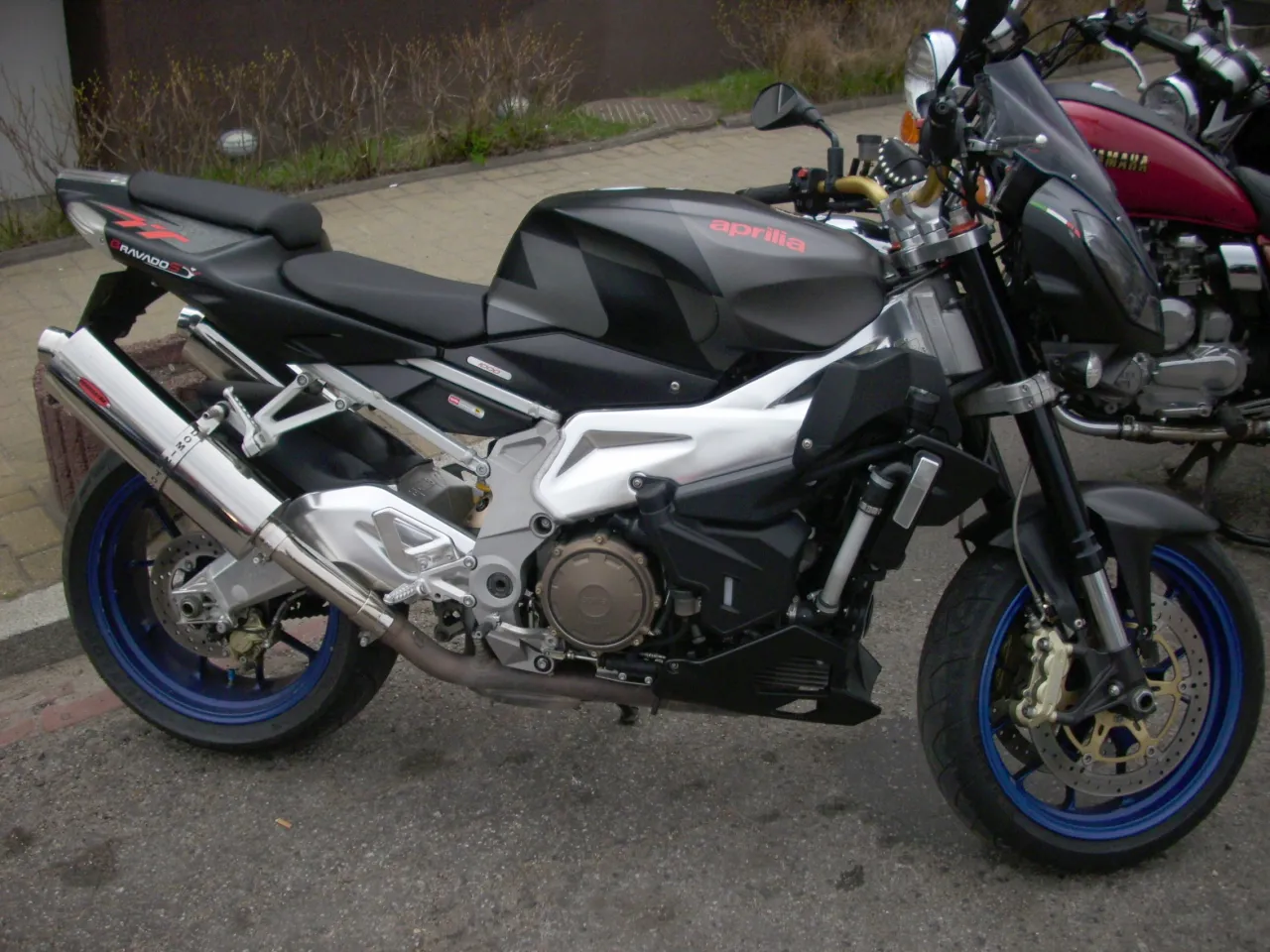 Aprilia Tuono 1000R parked outdoors