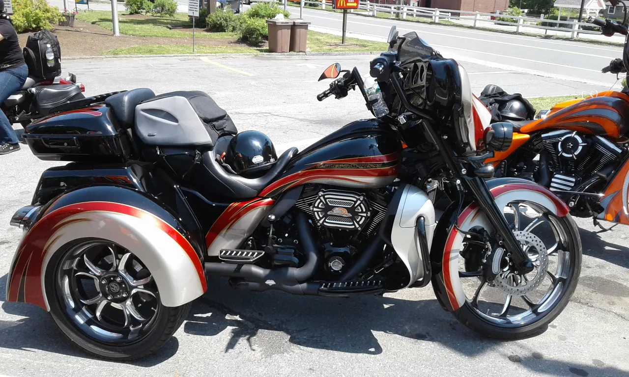 Harley-Davidson tricycle parked on street