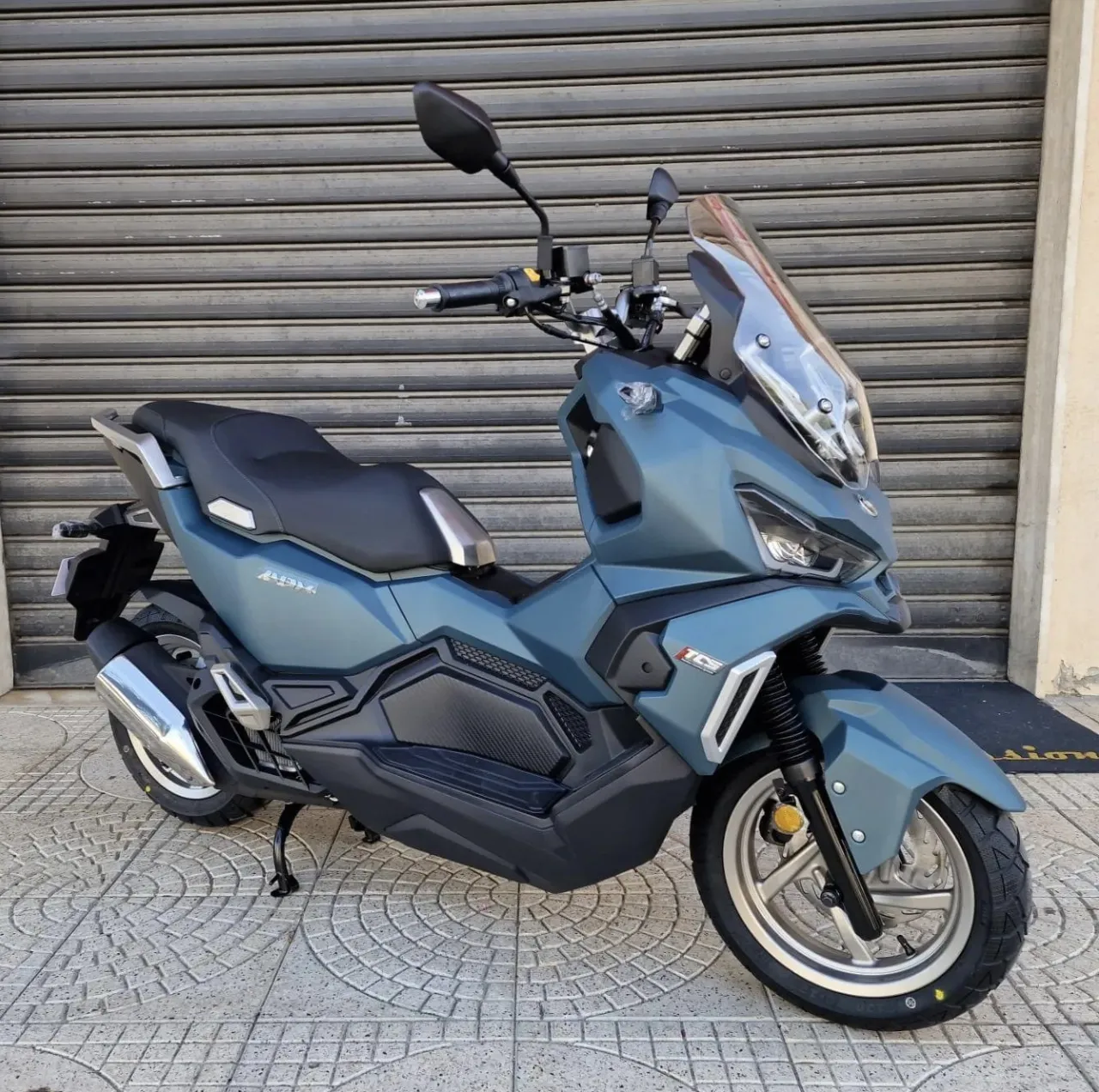 SYM ADX 125 adventure scooter side profile