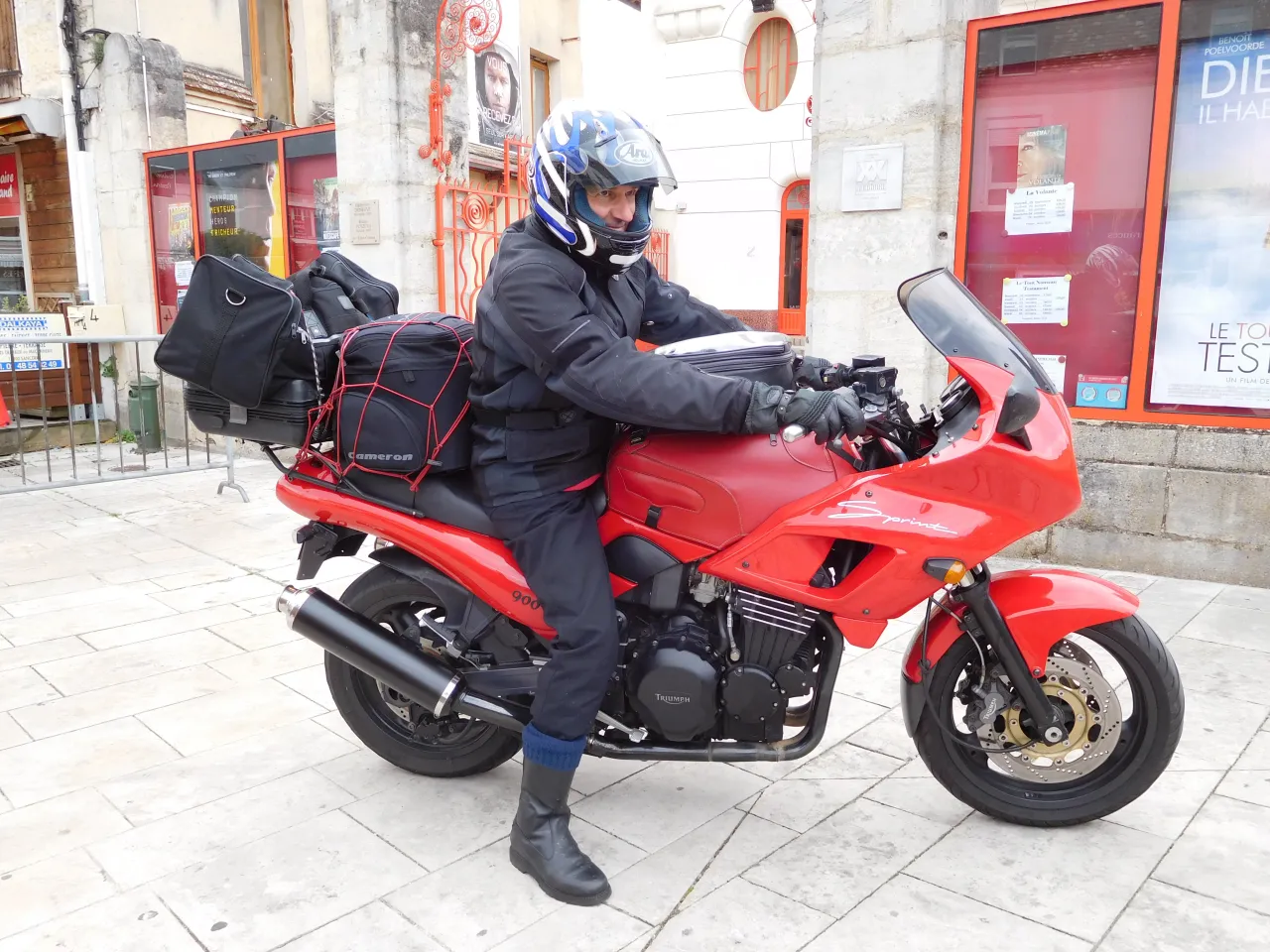 Triumph Sprint 900 parked outdoors